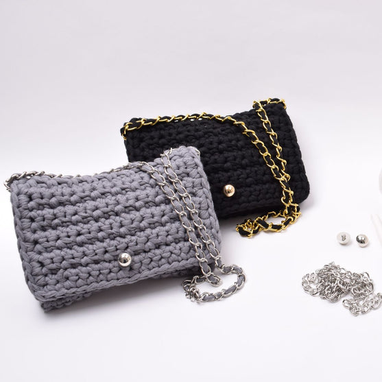Ribbon Clutch-Handtasche
4