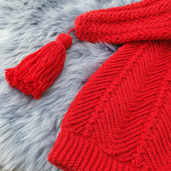 Weihnachtsfreude-Zipfelmütze
4