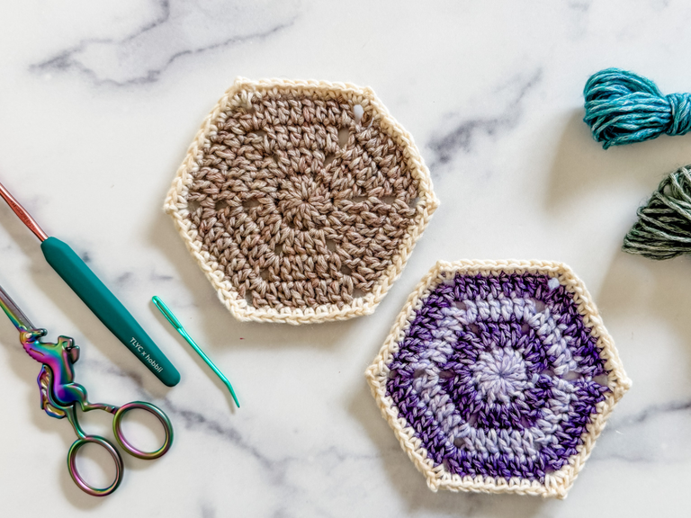 Two crochet hexagon motifs for the #FrostandBloomCAL by Toni Lipsey, displaying the solid beige gauge swatch and a purple hexagon.