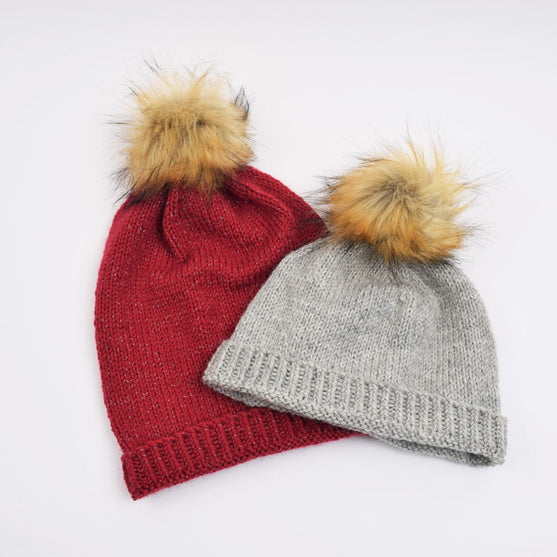 

Gestrickte Mütze mit Reflex
2