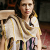 

Calendula Shawl - Wrap mit Noppen und Fransen
2