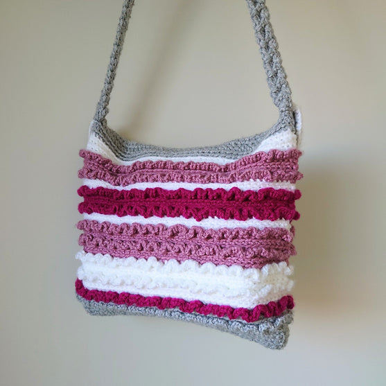 

Love Fest - Schultertasche
4