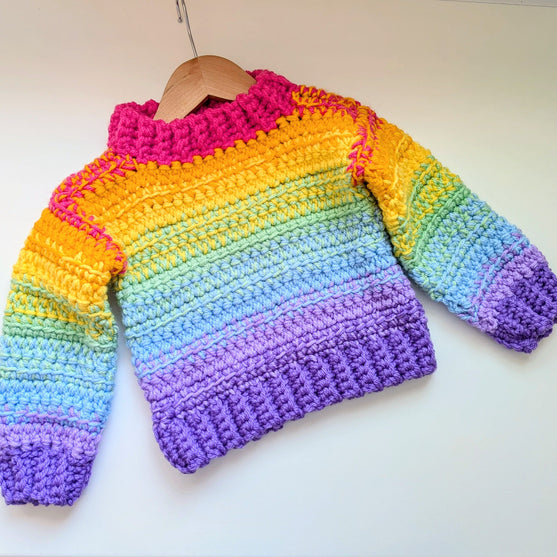 

Cosy Rainbow Jumper - Kinderpullover
2