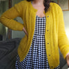 

Feather - Cardigan
2