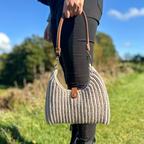 

Amelia - Handtasche
5