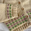 

Romi - Kinder-Cardigan
5