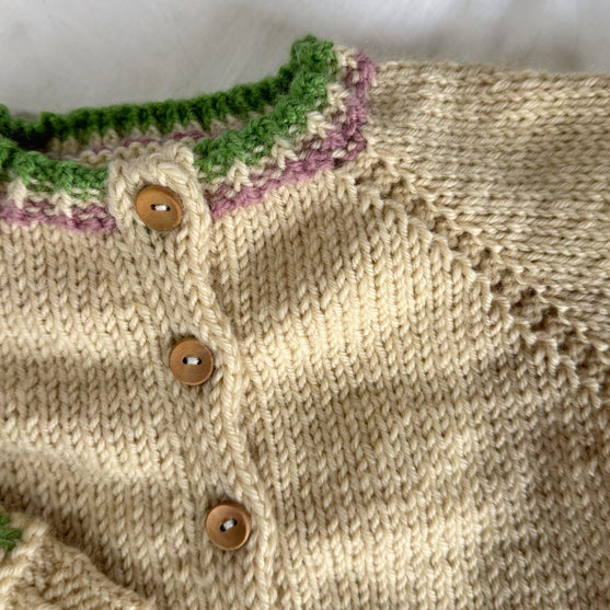 

Romi - Kinder-Cardigan
6