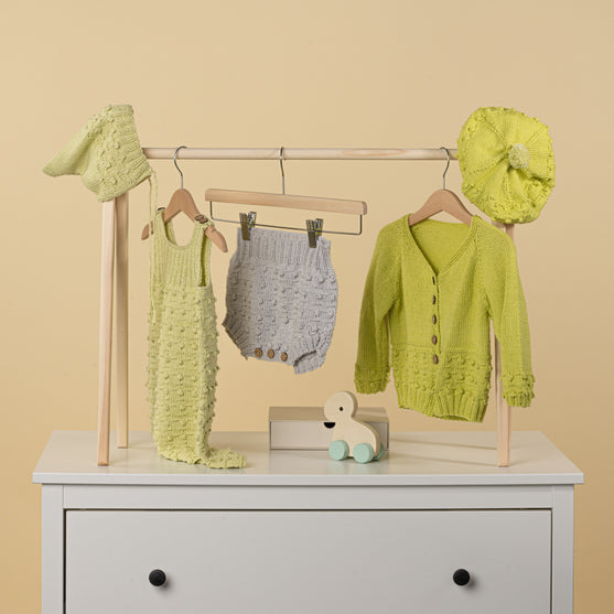 

Poppy - Kinderstrickjacke
7